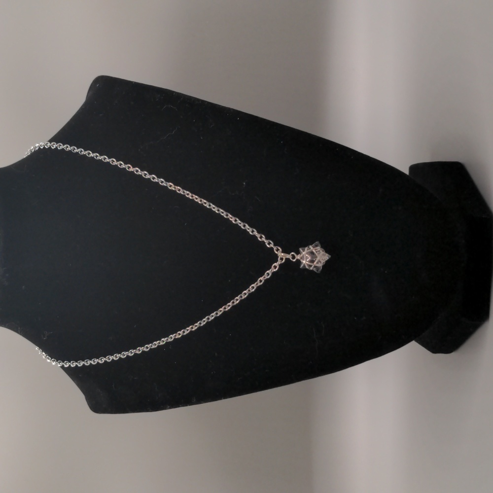 Hand Crafted Star Necklace

18in. Chain
